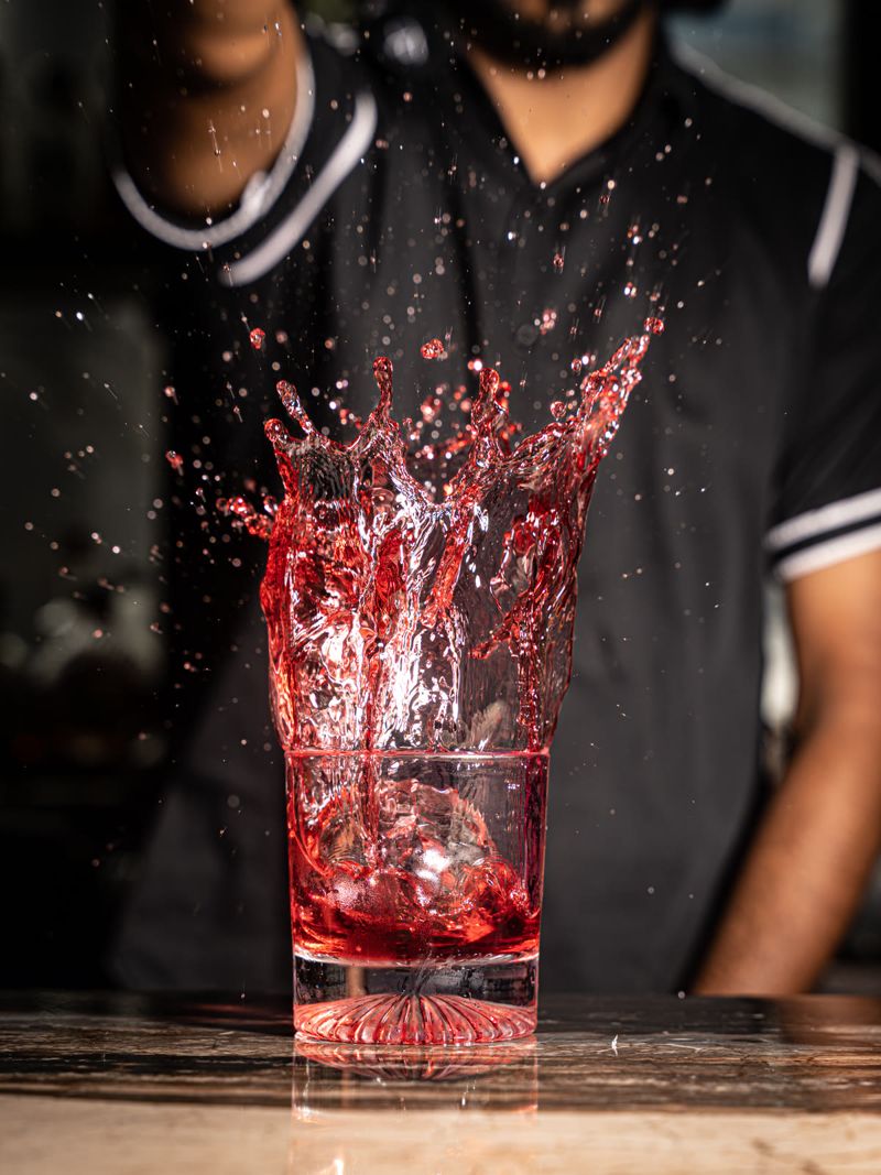 Food photograph by Hiren: a drink splashing in a glass